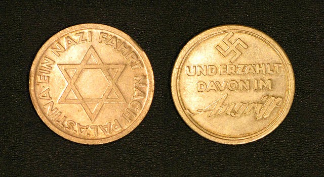 מטבע שמצידו האחד צלב קרס, ומצדו השני מגן דוד